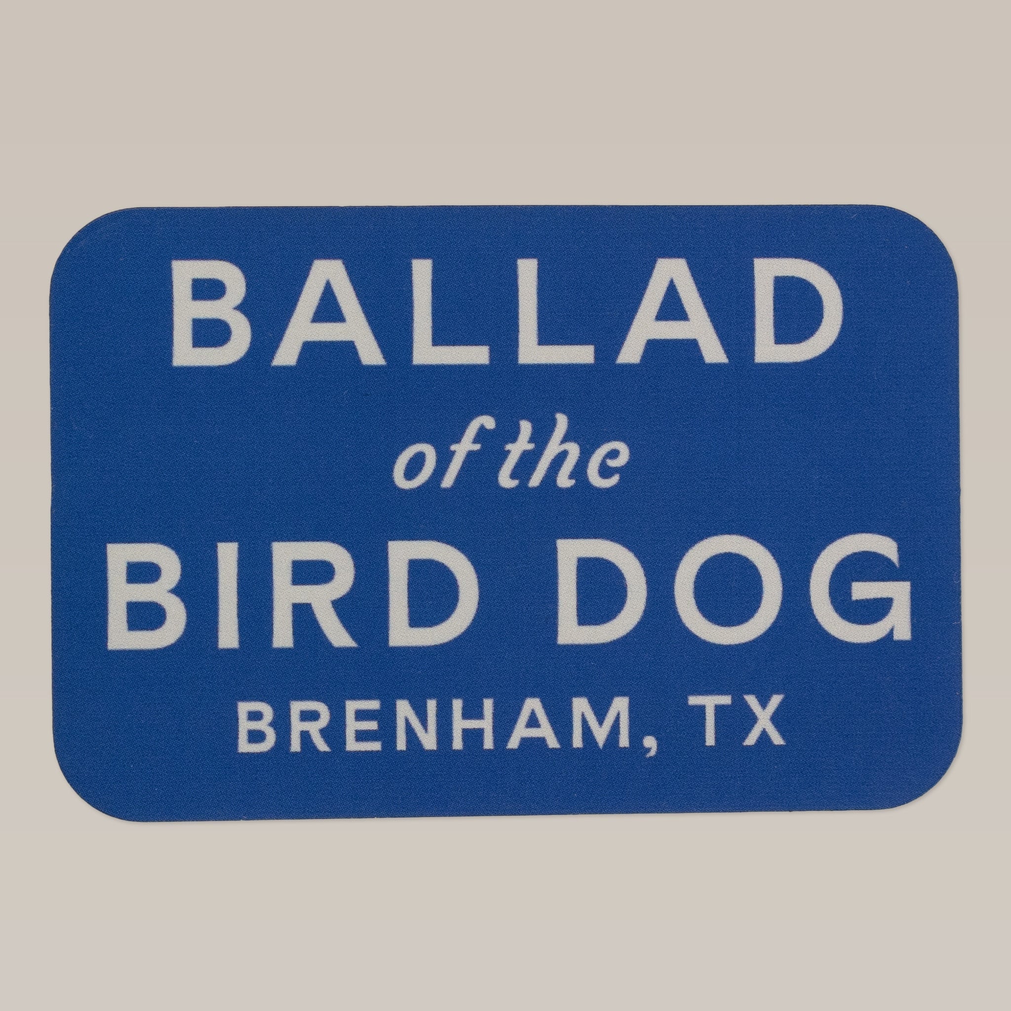 The Ballad of the Bird Dog Shop Sticker features a blue 3x2" rectangle design with white "BALLAD of the BIRD DOG BRENHAM, TX" text and an updated logo.