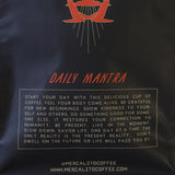 Black coffee bag featuring red artwork and "Daily Mantra" instructions for mindfulness, kindness, and savoring the moment. Contains Mescalito Coffee's Single Origin Whole Coffee Beans | Chelchele—a medium roast Ethiopian coffee. Brand website at bottom.