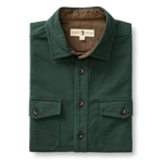The Duck Head Slater Moleskin Overshirt is a folded dark green shirt featuring two front pockets and a branded collar label, ideal as a rugged, durable outer layer.