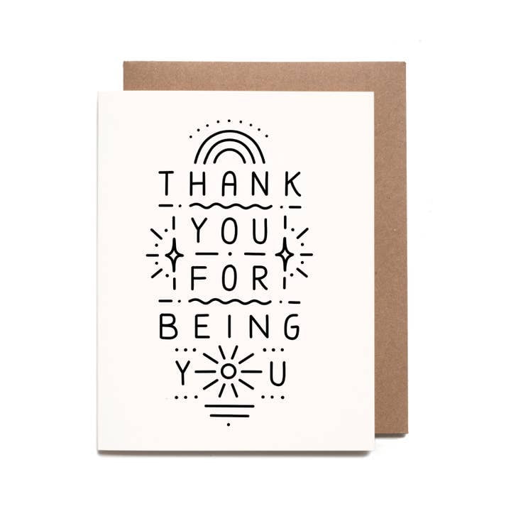 The Worthwhile Paper "Thank You For Being You | Worthwhile" card features black text, decorative lines, a rainbow, and star accents, set above a brown envelope—perfect for uplifting a friend.