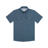 The Ahi by Poncho: a blue, short-sleeve, button-up quick-dry shirt with a collar and two chest pockets, shown on a plain white background.