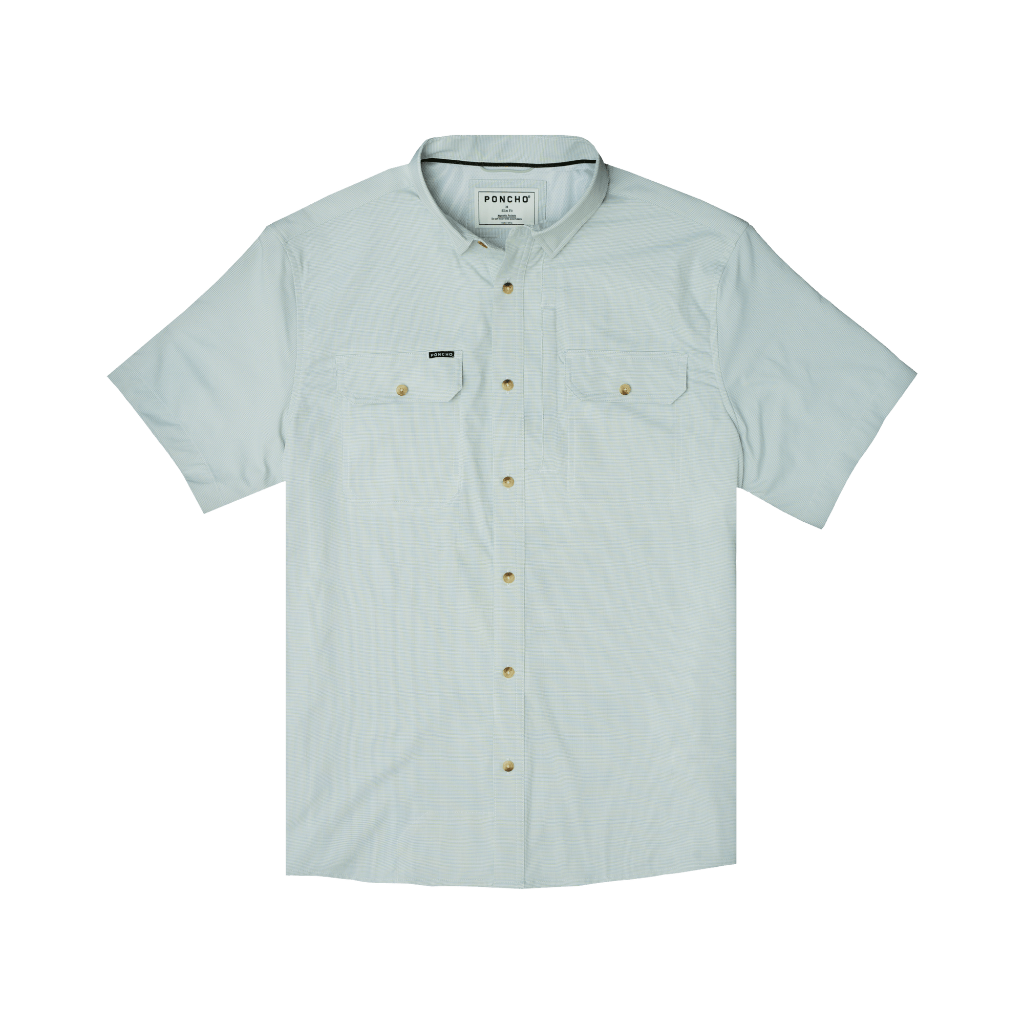 The Poncho Carolina Rig is a light blue short-sleeve button-up shirt with dual chest pockets and a small left pocket label, made from breathable, quick-drying fabric with UPF 50+ protection. Shown laid flat on a white background.