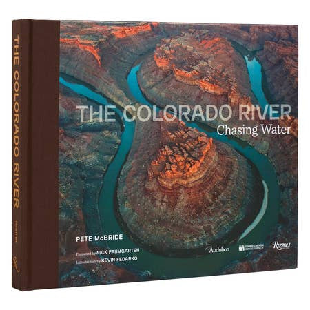 The Colorado River" by Penguin features an aerial photo of the river winding through a rocky canyon, showcasing its vital role in the Western water crisis.