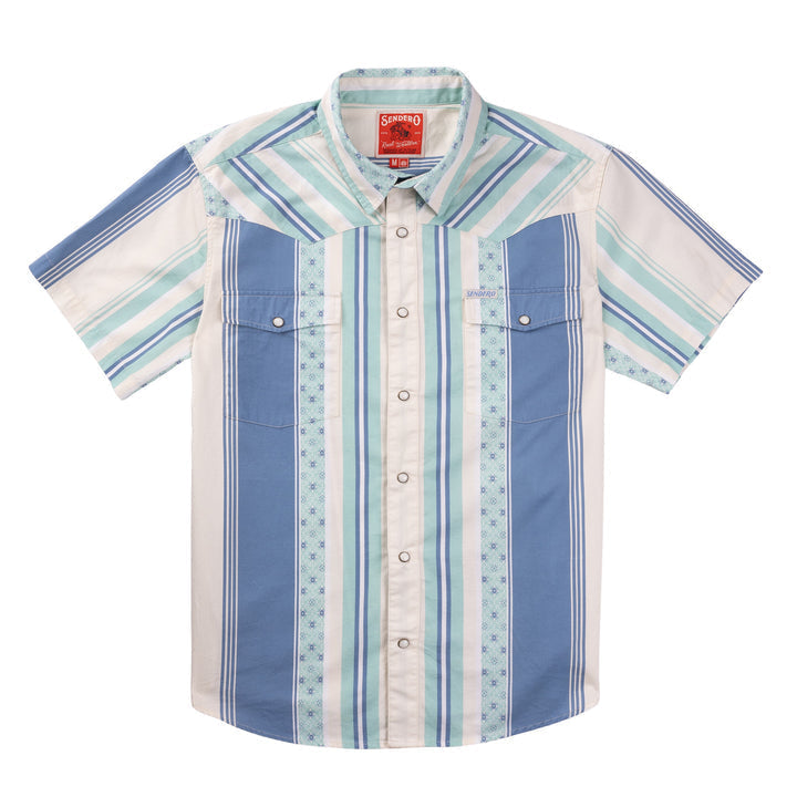 The Wyatt Pearl Snap by Sendero Provisions Co. is a short-sleeve western shirt with blue, teal, and white vertical stripes, chest pockets, pearl snap buttons, and a pointed collar.