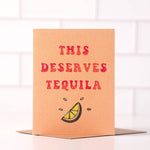 Send sunny, California vibes with the “This Deserves Tequila” card by Daydream Prints, featuring bold red lettering and a lime wedge illustration—perfect for cheerful greetings.