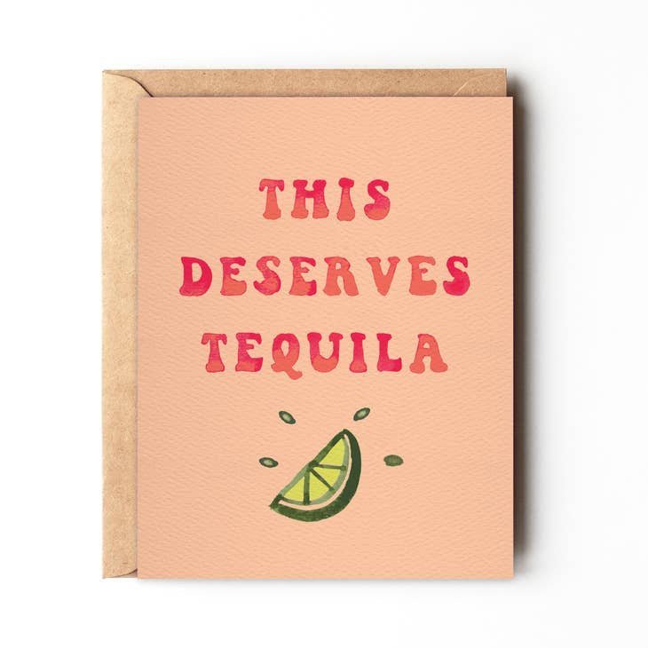 The "This Deserves Tequila" greeting card by Daydream Prints features red text above a lime wedge with juice droplets, adding a fun California beach vibe to your eco-friendly card collection.