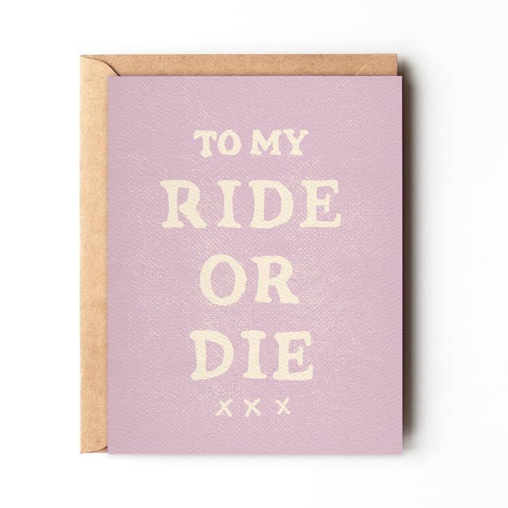 The "To My Ride Or Die | Daydream Prints" card by Daydream Prints features bold white text on retro pink and comes with a brown envelope—the perfect greeting card for your closest friend.