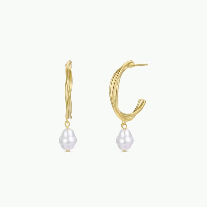 The Twisted Pearl Drop Hoop - Gold Earrings by JaxKelly feature gold-plated, twisted hoops with a single white freshwater pearl drop. These hypoallergenic earrings are displayed on a plain white background.
