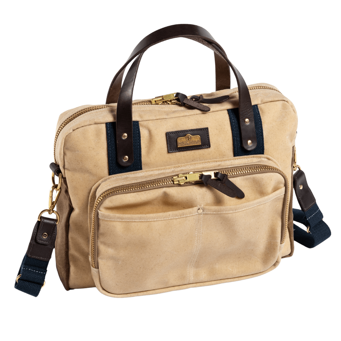The Duck Head Waxed Canvas Laptop Bag features leather trim, dual top handles, a detachable shoulder strap, front zippered pocket, gold-tone hardware, and a trolley sleeve.