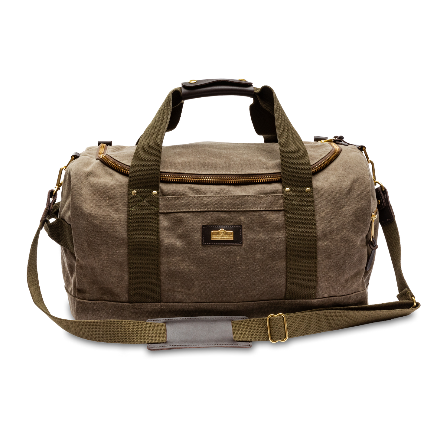 The Duck Head Waxed Canvas Overnighter Duffel in Field Brown features olive green straps, a front zipper pocket, brass hardware, and a detachable shoulder strap, shown against a white background.