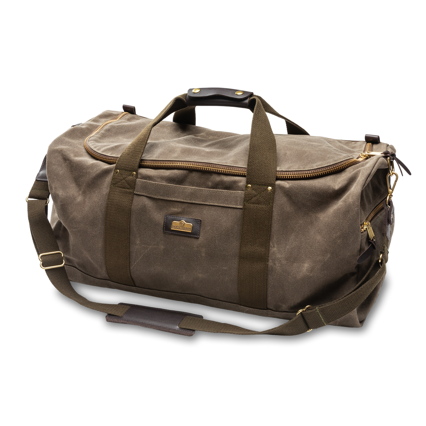 The Duck Head Waxed Canvas Weekender Bag features brown waxed canvas, dark brown straps, a zip main compartment, exterior pocket, detachable shoulder strap, is carry-on compliant, and made in the USA.