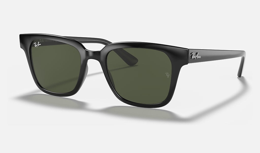 A pair of Ray-Ban 0707 Wayfarer sunglasses with black rectangular frames and dark green lenses, made from lightweight plastic, displayed on a light gray background.