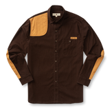 The Duck Head Woodland Shooting Shirt is a brown, stretch twill long-sleeve with tan quilted patches on the right shoulder, left chest pocket, and elbows, shown on a white background.