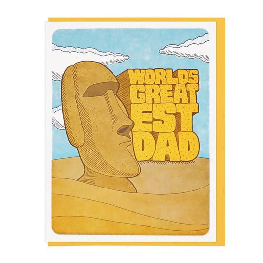 The "World's Greatest Dad Moai" card by Lucky Horse Press features an illustrated Easter Island head, bold yellow text on a blue sky, is blank inside, and has a recycled cover for an eco-friendly touch.