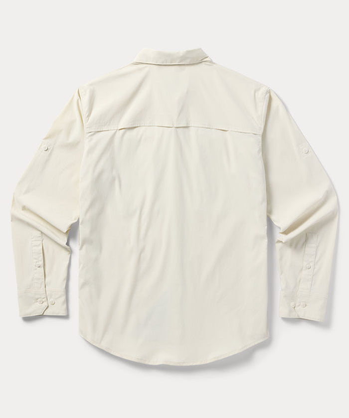 Back view of Duck Camp W's Lightweight Fishing Shirt Long Sleeve in cream, featuring a shoulder yoke and buttoned cuffs.