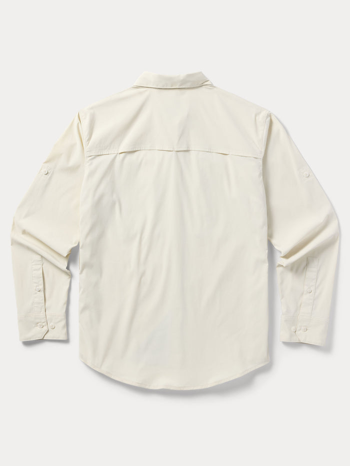 Back view of Duck Camp W's Lightweight Fishing Shirt Long Sleeve in cream, featuring a shoulder yoke and buttoned cuffs.