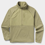 The Duck Camp W's Lightweight Grid Tech Fleece Half Zip in Sagebrush is a light olive green midlayer pullover featuring a quarter-zip front, chest pocket, and stand-up collar, made from textured tech fleece fabric.