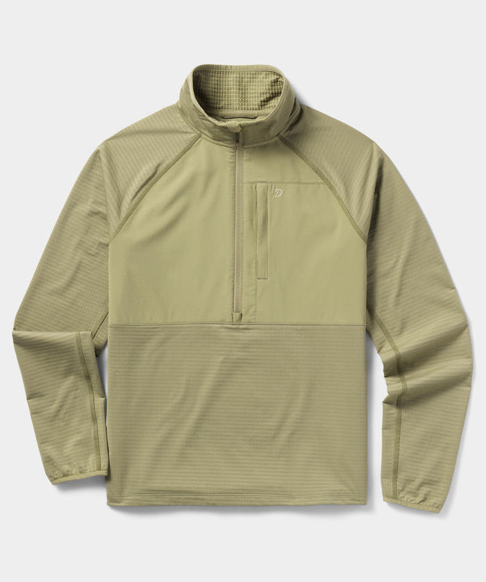The Duck Camp W's Lightweight Grid Tech Fleece Half Zip in Sagebrush features a light olive green color, quarter-zip front, high collar, and chest pocket—ideal midlayer. Shown on white background.