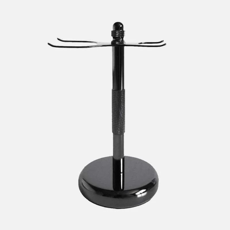 The Rockwell Razors 3-Piece Shave Stand features a metal design with a round base, central pole, and two hooks—ideal for organizing double-edge razors and brushes for wet shavers.