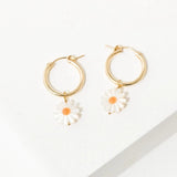 The Barrymore Earrings by Larissa Loden feature gold-filled hoops with white mother of pearl daisy charms and orange centers—Drew Barrymore-inspired accents to elevate any look.