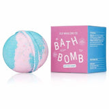 A blue and pink Old Whaling Co. Cotton Candy Bath Bomb sits beside its matching box, with epsom salts for a relaxing soak.