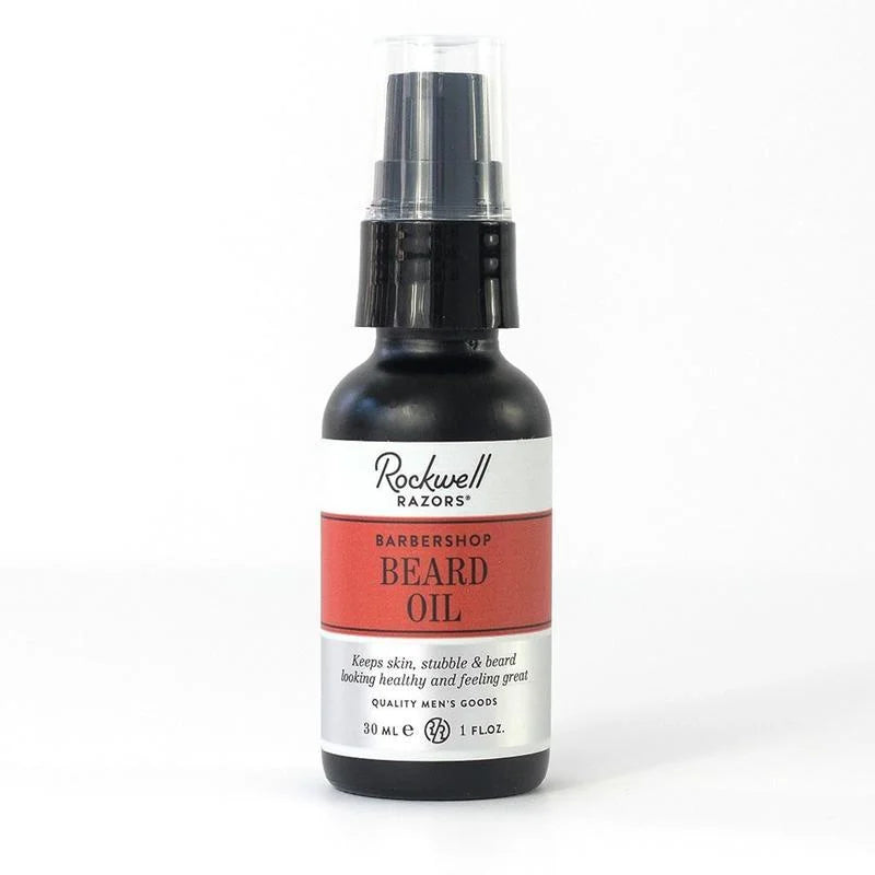Rockwell Razors Beard Oil in a sleek black bottle with a clear pump for grooming