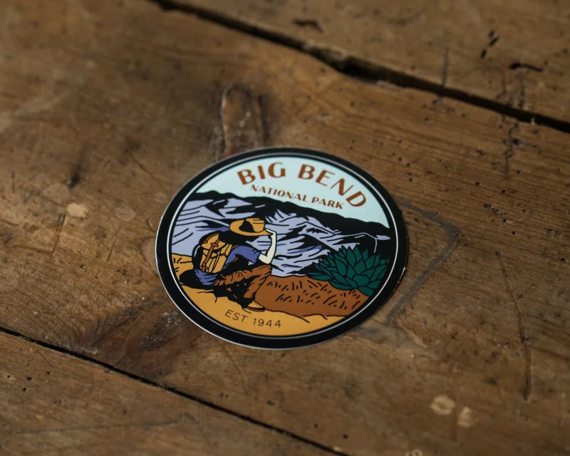Big Bend National Park Badge On Wooden Table - Sendero Provisions Co.