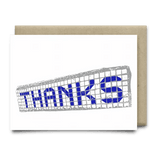 The Blue Tiles Thank You Card by Anvil Cards is a white A2 linen card featuring "THANKS" in blue across a gray net design, blank inside for your message.