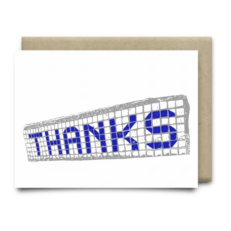 The Blue Tiles Thank You Card by Anvil Cards is a white A2 linen card featuring "THANKS" in blue across a gray net design, blank inside for your message.