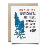Bluebonnets Are Blue Card by Anvil Cards: A2 size, features bluebonnet illustration and "Roses are red, bluebonnets are blue, pralines are sweet, and so are you!" on linen paper. Blank inside for your message.