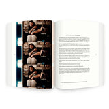 An open book, A Dance with Fred Astaire by Anthology Editions, shows three film stills of a woman seated and smiling on the left page, and text about John F. Kennedy’s camera on the right—a window into postwar culture.