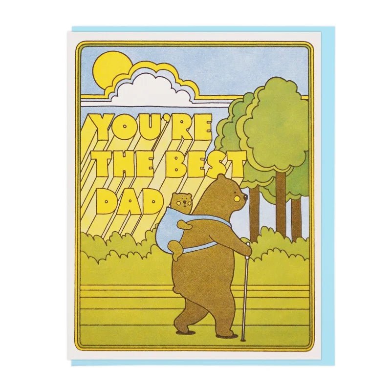 The "Best Dad Hiking Bears" card by Lucky Horse Press features a bear carrying a cub in a sunny forest with "YOU'RE THE BEST DAD" in bold yellow, printed on recycled cover and made in the USA.