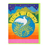 The "Peace on Earth" card by Lucky Horse Press features a white dove with an olive branch and retro stars and clouds, plus an eco-friendly recycled cover.