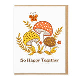 The "So Happy Together" card by Lucky Horse Press features three colorful mushrooms, a butterfly, and leaves, letterpress printed on recycled cover with the caption "So Happy Together." Made in the USA.