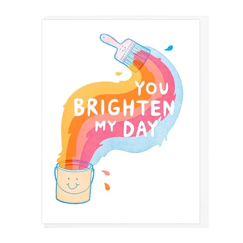 A paintbrush paints colorful stripes from a smiling paint can, forming "You Brighten My Day." This cheerful letterpress card by Lucky Horse Press is made in the USA.