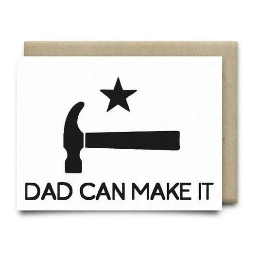 The Dad Can Make It Card by Anvil Cards is a blank A2 greeting card featuring a black hammer and star above “DAD CAN MAKE IT” on white, paired with a brown envelope. Printed on premium linen paper—perfect for Father's Day.