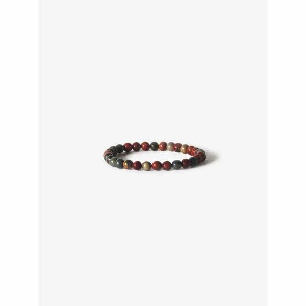 Earth Bracelet Featuring Red And Black Beads From Branco, Symbolizing Power & Healing.