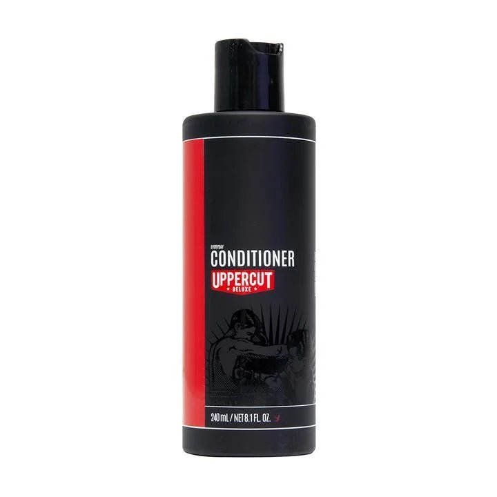 A black bottle of Everyday Conditioner by Uppercut Deluxe, with a red and white label featuring a boxer graphic and marked 240ml. This men's conditioner contains nourishing olive leaf extract.