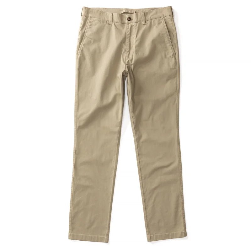 A pair of Duck Head Gold School Chino pants in beige, made from cotton twill with front and back pockets, button closure, and straight legs are displayed flat on a white background.