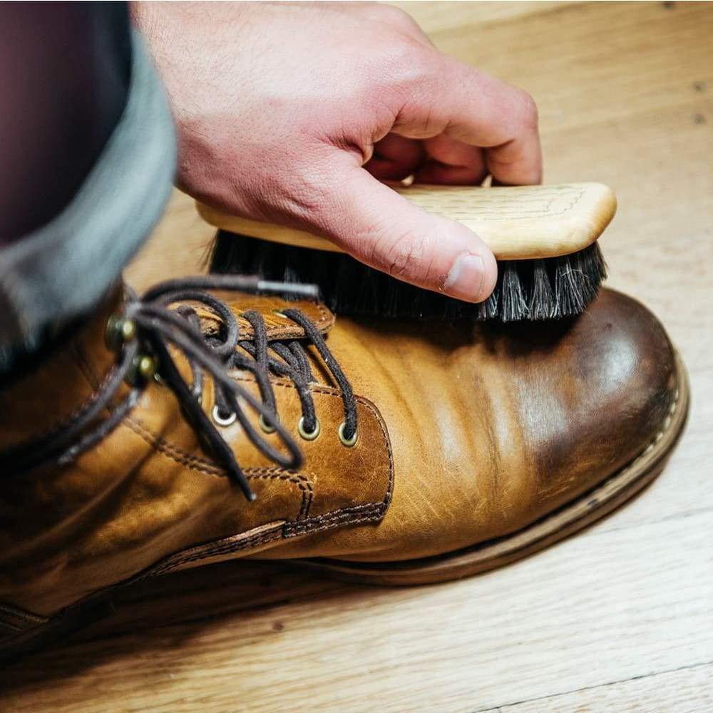 Leather shoe being polished with a Premium Horsehair Shoe Brush and horsehair bristles