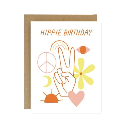 The Worthwhile Paper Hippie Birthday Card features "Hippie Birthday" text, a peace sign hand, and colorful art, screen printed with water-based inks on recycled white paper for an eco-friendly celebration.