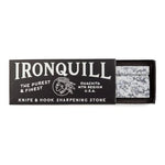 A partially open rectangular box labeled "Ironquill | Hook & Knife Sharpening Stone | Mollyjogger" reveals two gray, high-purity silica sharpening stones inside.