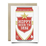 The Hoppy Beerthday Lone Star Card by Anvil Cards features a beer can with "Hoppy Beer-th Day" and a Texas outline on linen paper. This A2 card is blank inside, ideal for personalizing your birthday wishes.