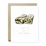 The I Love You Like A 3am Taquito Card by Anvil Cards is an A2 greeting card featuring a sliced taquito illustration and fun text, printed on linen paper, blank inside, and comes with an envelope.