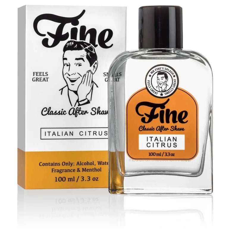 A bottle of Fine Accoutrements Italian Citrus Classic Aftershave stands beside its matching retro-branded box, both displaying product details and inspired by Acqua di Parma.