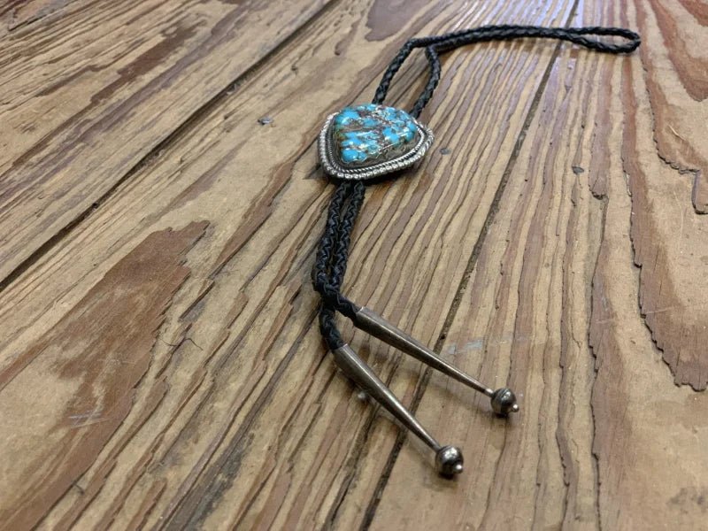 Large turquoise bolo tie with braided leather cord vintage accessory
