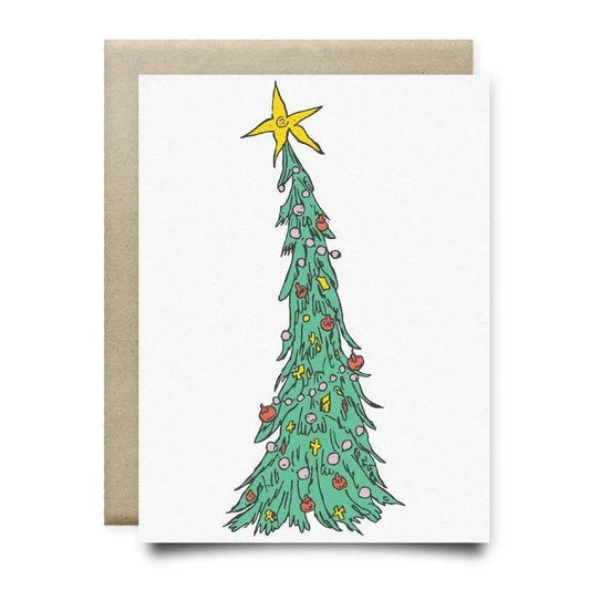 The Leaning Tree Christmas Card by Anvil Cards features a tall, thin Christmas tree with ornaments and a large yellow star on elegant linen paper. A2 size, blank inside for your message.