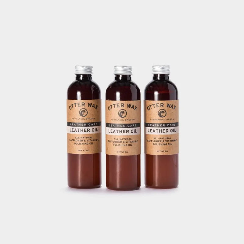 Four Bottles Of Coffee Leather Oil Otter Wax Product Display
