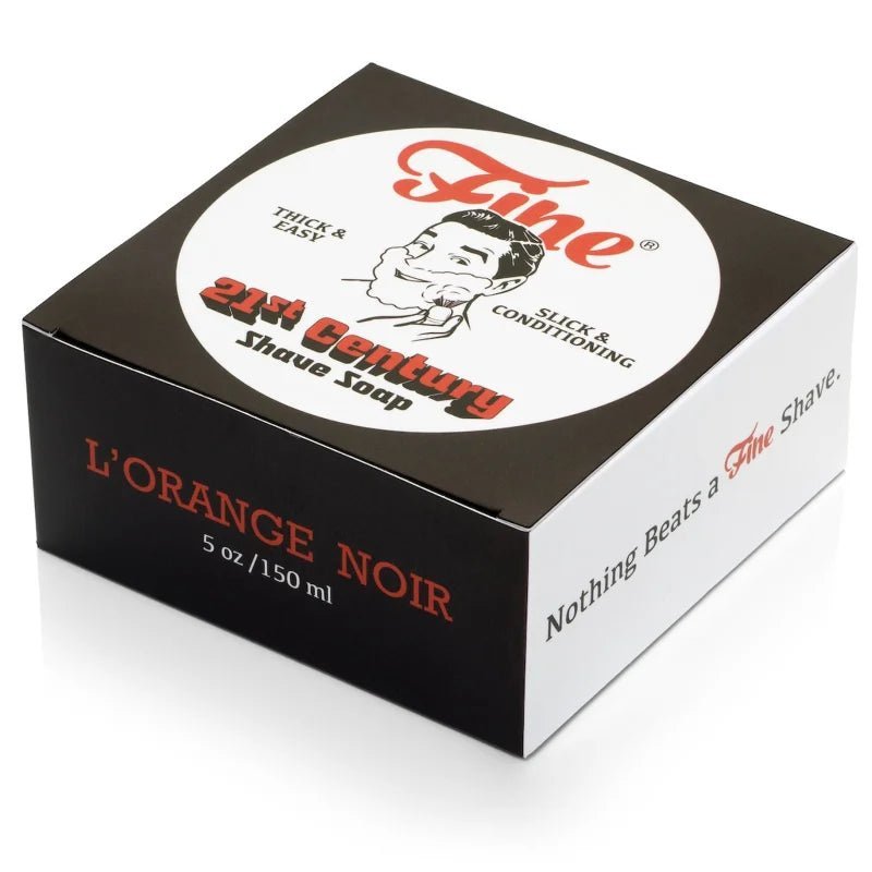 The Fine Accoutrements L'Orange Noir 21C Shave Soap, handmade in Italy in a 5 oz box, features retro branding and the "Nothing Beats a Fine Shave" slogan with a Terre d'Hermes-inspired scent.