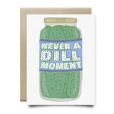 The Never A Dill Moment Card by Anvil Cards features a jar of pickles and the phrase "Never a dill moment." This A2 linen paper greeting card comes blank inside with a matching envelope.